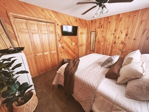 Bedroom 2 -- Kick back on the king size with a Fire TV to stream all your favorites shows.