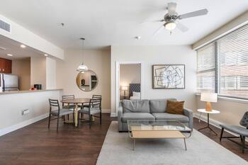 Modern Luxury: 2BR Condo with Rooftop Pool Oasis