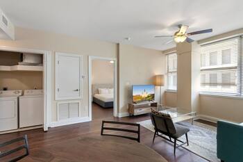 Contemporary Urban Haven: 2BR Condo with Rooftop Serenity