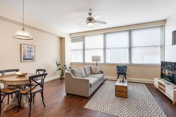 Rooftop Reverie: Modern Elegance in 1BR Condo with BBQ Area