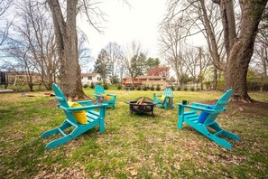 Patio in the backyard with fire pit