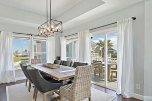 This dining area is located next to the kitchen
