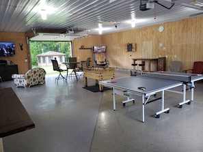 30x40 Party room w/ Large screen tv, Ping Pong, foosball, darts, Board games!