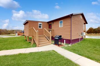Dog-friendly, lakefront cabin with porch, deck & firepit - near wineries, hiking