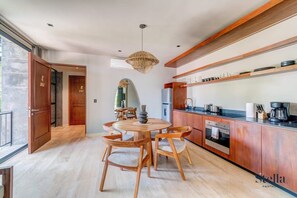 The open kitchen is fully equipped with everything you need to prepare healthy meals