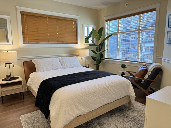 Master Bedroom/ Queen bed, smart TV, chair, walk-in closet, ensuite, air cond.