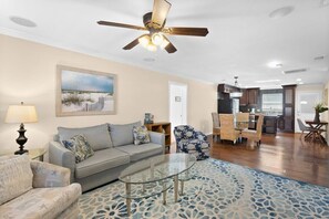 Expansive living room with ample seating and smart TV