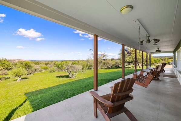Front porch - perfect for morning coffee, the sunrise, and views of Enchanted Rock