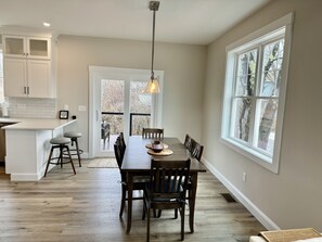 Dining area with access to outdoor patio 