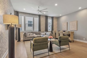 The open concept living room and kitchen with dining table ensure that everyone can participate in the fun!
The home offers plenty of space to spread out and settle in.