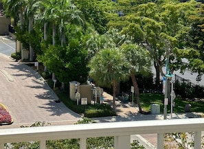 Free beach access as seen from our balcony. This beach access has no parking, so it is for the exclusive use of those that are within walking distance and has a dedicated crosswalk with lights to stop traffic