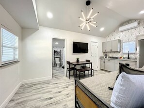 space with living room, dining room and kitchen