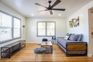 A daybed it provides a comfortable and versatile seating and sleeping option for guests, can be used as both a sofa and a bed.