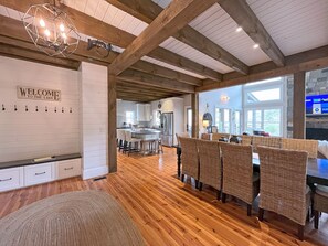 Entry Foyer.  Family Lake House features an open floor plan Main Level.  Dining and Great Room straight ahead, Kitchen on the Left, Master Bedroom suite and stairs to Upper and Lower Levels on the right