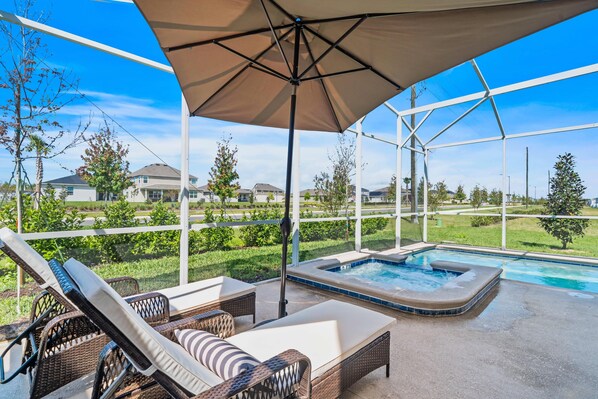 Refreshing Private Pool Area of the Apartment in Kissimmee Florida - Sun lounges - Relax by the shimmering poolside oasis - Lounge in tranquility by the sparkling waters