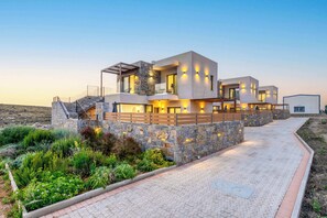 Exterior of the property under the night light