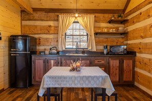 Kitchenette: Dishes, pots, and pans, cooking utensils, silverware, oil, and salt and pepper are provided.