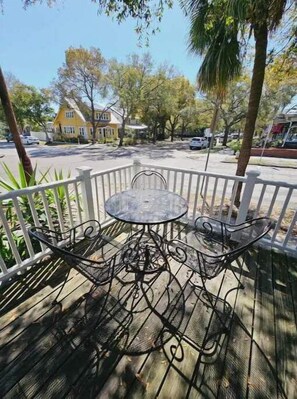 Shared patio space in front of the building.