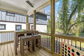 Veranda with conversation table with jengga and connect 4 game