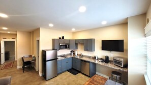 Full Kitchen with computer work area on left side of photo