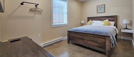 Bedroom with Queen Bed, AC, and 55 inch Smart TV