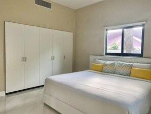 King bed with premium linens-relax in hotel-quality comfort