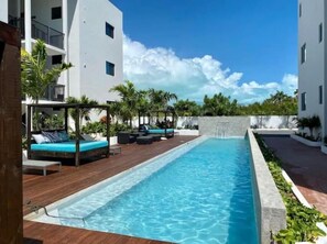 Heated 60-ft pool with plenty of loungers & shaded seating
