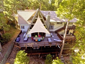 This is the back of the property w/lush forest views! The studio is to the right