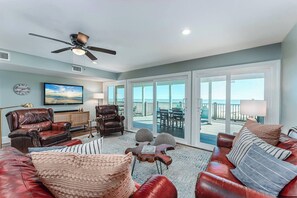 Roomy Living Area With Multiple Sliding Doors Allow you to Take In the Endless Views