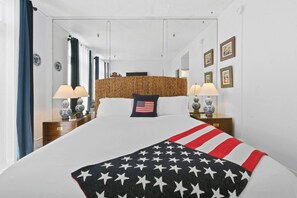 A charming studio offers 264 square feet of comfort, complete with a plush full bed and fresh linens.