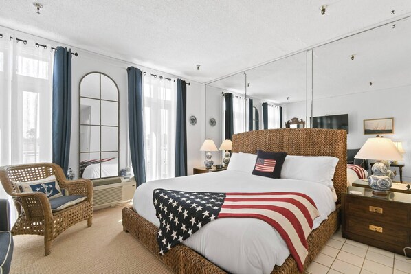 A charming studio offers 264 square feet of comfort, complete with a plush full bed and fresh linens.