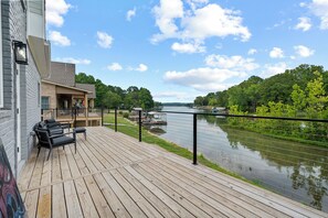 Our spacious back deck overlooking the lake