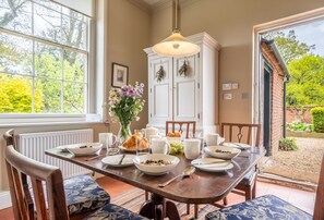 The Gate House, Wolterton Park, Blickling: Open-plan kitchen and dining room leading out into the garden