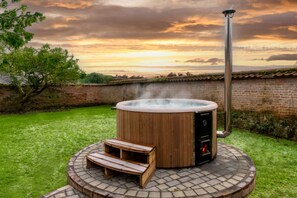 The soothing wood-fired hot tub