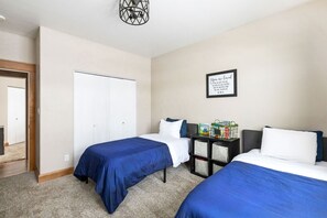 Escape to Serenity: Retreat to our vacation rental channels offering 2 twin bedrooms nestled amidst breathtaking natural surroundings.