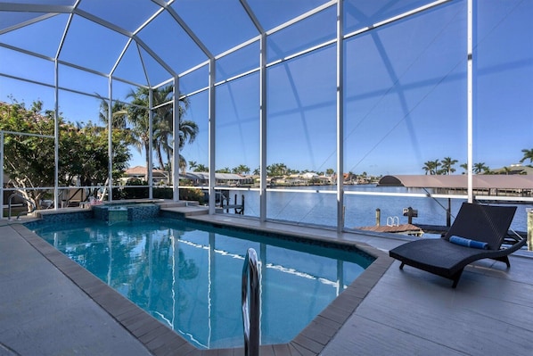 Enjoy the pool and jacuzzi with covered sun screen