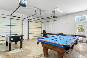 Game room with pool table, foosball and shuffleboard