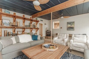 Tons of cozy seating in the den