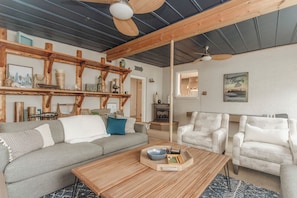 Tons of cozy seating in the den