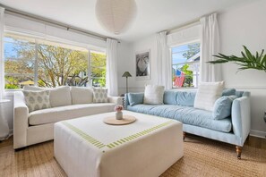 Spacious living room with plenty of seating and a smart TV!