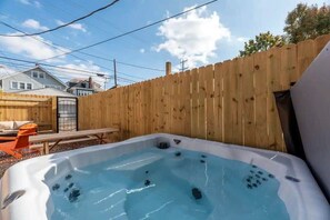 Enjoy our hot tub and accommodating space!