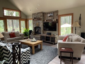 Great Room- very open with spectacular forest views out of all windows