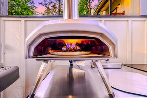 Make homemade craft pizzas in our Ooni Outdoor Pizza Oven - the possibilities are endless!