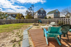 The Outdoor Entertainment Area out back promises beautiful evenings with s'mores over the fire pit during your vacation.