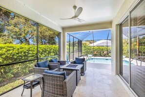 Relax & Unwind on the Screened-in Lanai