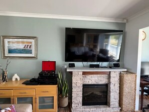 Electric fireplace, smart tv and playstation 4.
