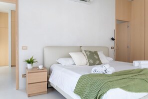Furniture, Interior Design, Bed, Bedroom, Wall, Flooring, Wood, Floor, Room, Ceiling