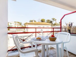 Table, Furniture, Sky, Building, Chair, Outdoor Furniture, Shade, Outdoor Table, Real Estate, Tree