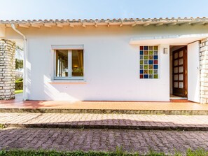 Window, Plant, Building, Sky, Shade, Rectangle, Door, Land Lot, Wood