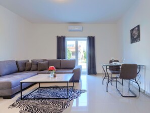 Furniture, Property, Table, Couch, Azure, Interior Design, Floor, Picture Frame, Living Room, Wood